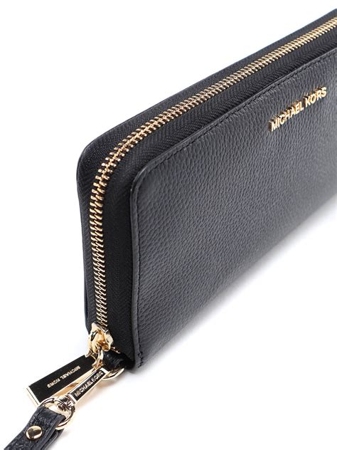 women michael kors jet set wallet|Michael Kors zippered wallet.